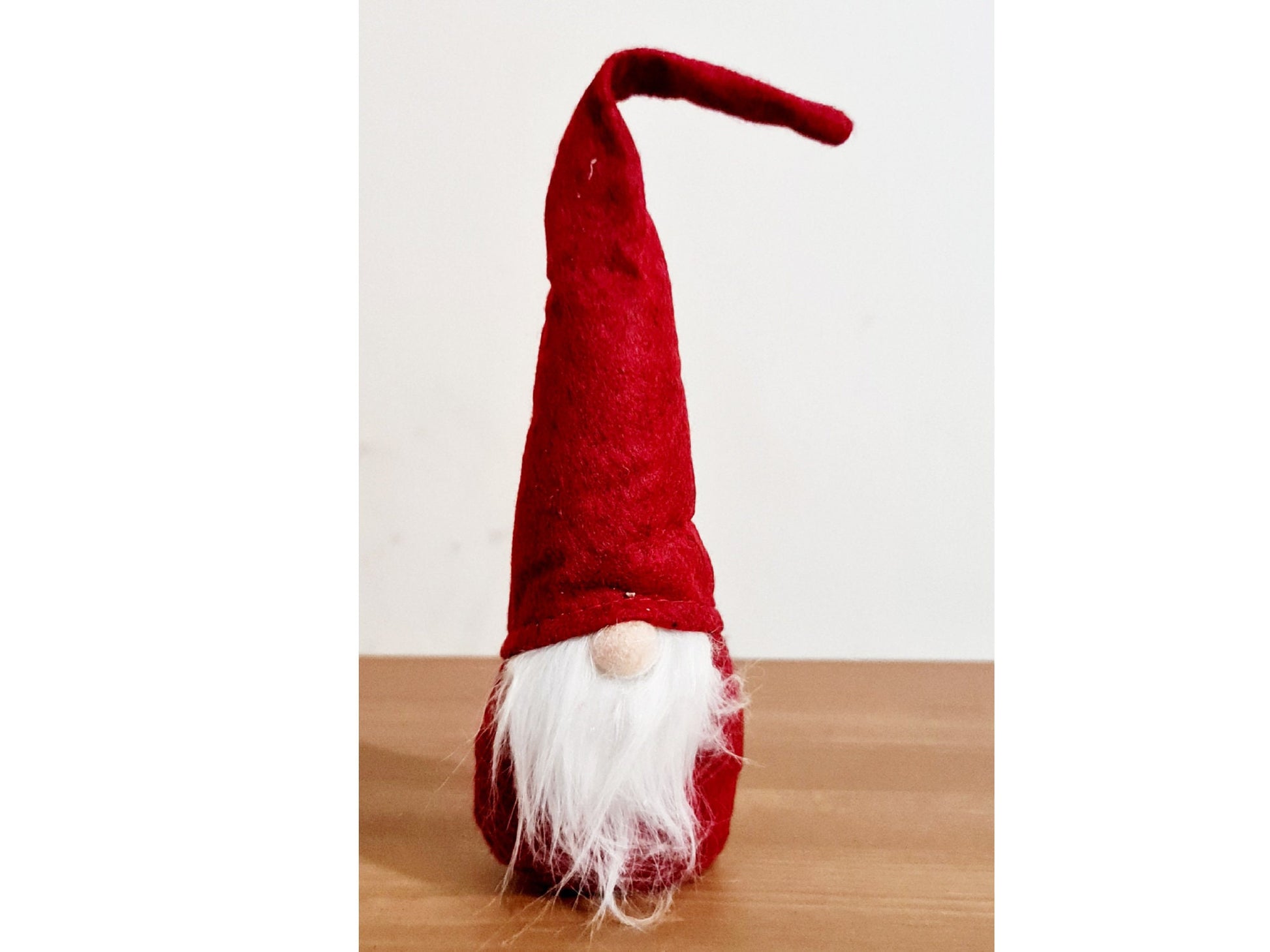 Range of personalised Christmas gonk decorations in red, green and grey displayed together