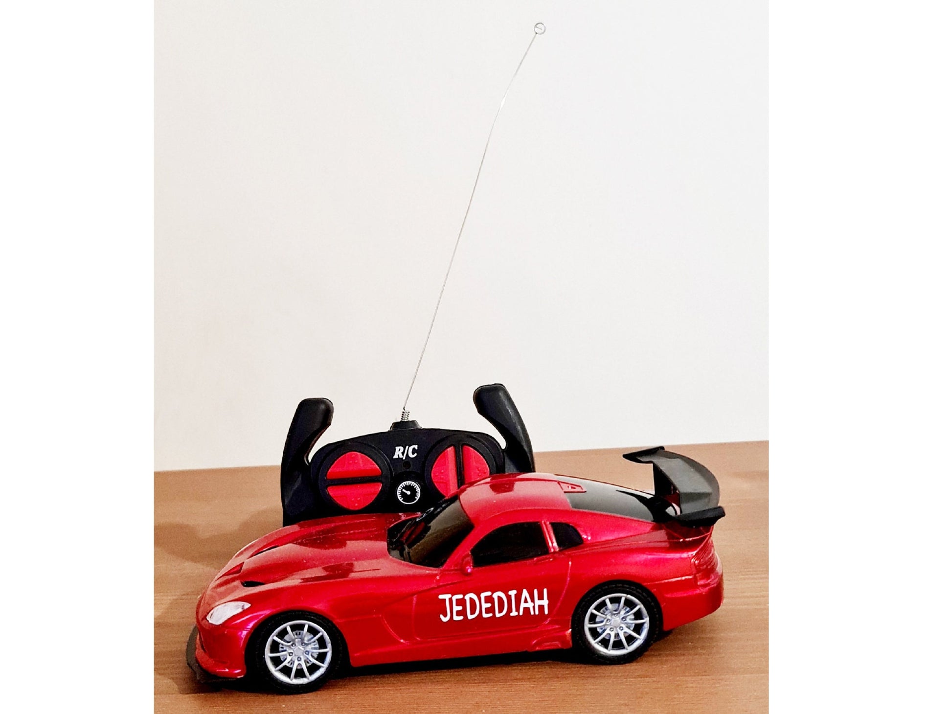 Personalised blue remote control car with custom name personalisation detail