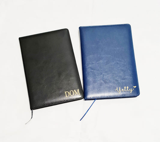 Personalised navy blue A5 vegan leather notebook with gold foil name on cover