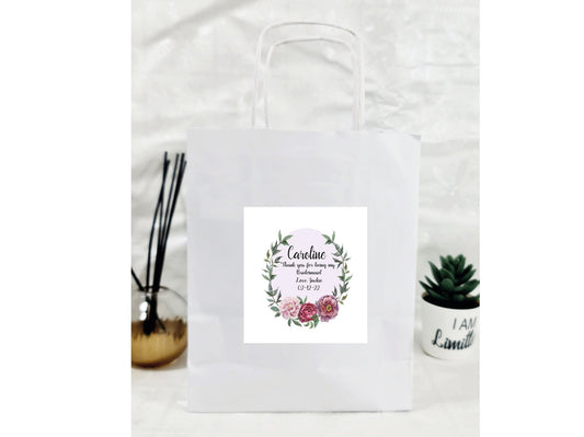 Personalised luxury paper gift bag with custom name and message sticker for celebrations