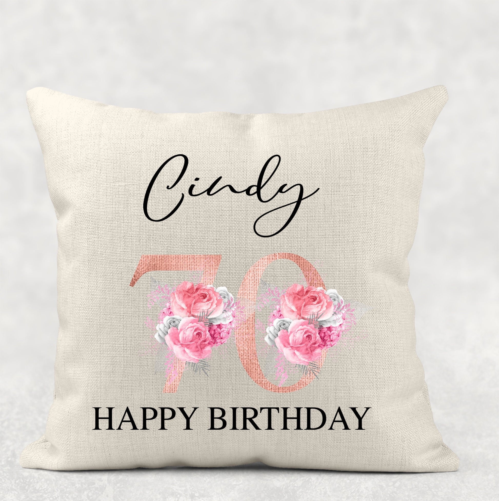 Personalised 70th birthday rose gold floral cushion with custom name, any age available