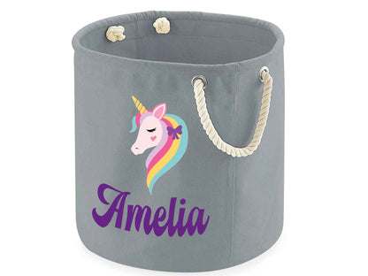 Personalised unicorn storage bags in natural and grey showing size options