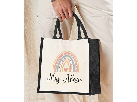Personalised rainbow jute lunch bag with custom name on colourful rainbow stripe design