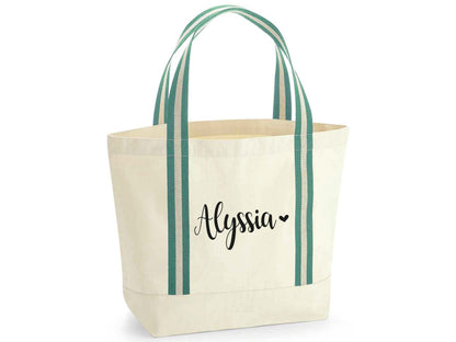 Close-up of personalised monogram detail on premium heavyweight beach bag