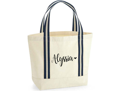 Personalised beach bag showing 19 litre capacity and cotton webbing shoulder straps