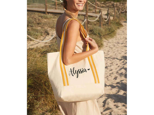 Personalised beach bag in natural with amber striped straps and custom monogram