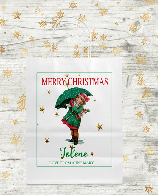 Personalised vintage Santa Christmas gift bag with custom name sticker and twisted handles